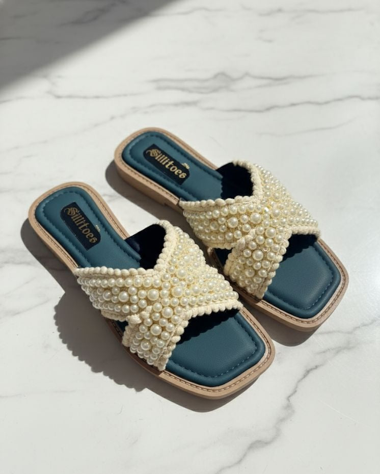 White pearl criss-cross strap flats